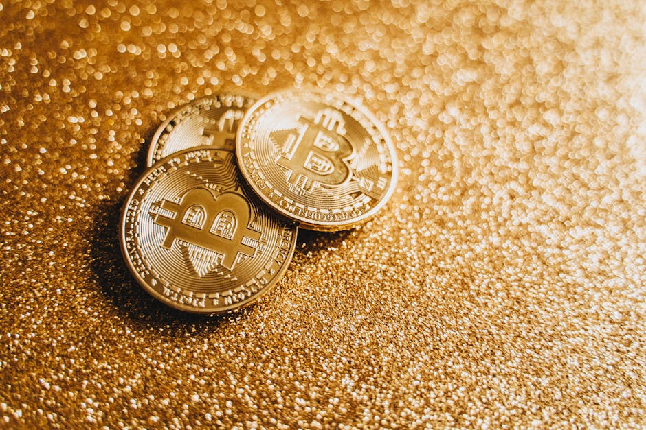 bitcoin and gold coins on a scale showing balance between digital and physical assets